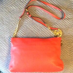 Michael Kors pink (coral) soft pebble leather crossbody bag for women